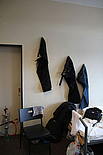 Unintentional sculpture - three pairs of trousers at the wall