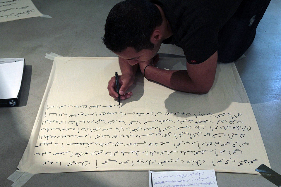 Amer writting a letter to his Mam (KUNSTASYL©caveng) 